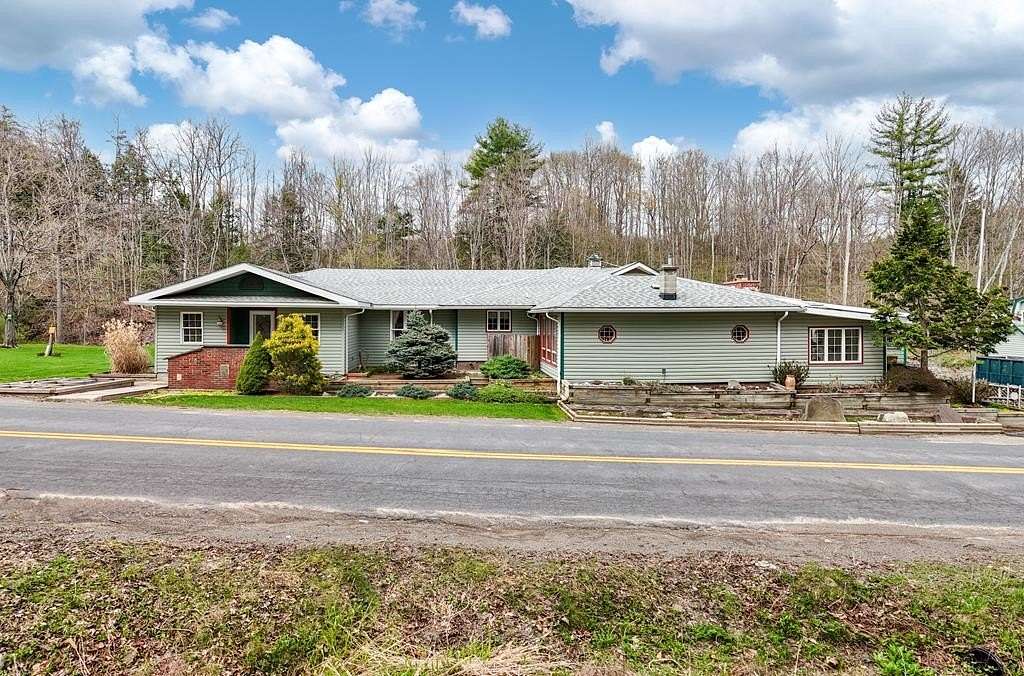 51.7 Acres of Agricultural Land with Home for Sale in Addison, New York