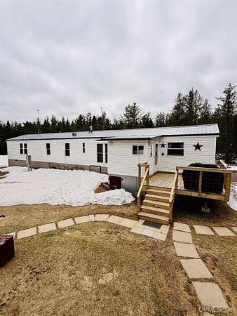 32.1 Acres of Land with Home for Sale in Ishpeming, Michigan