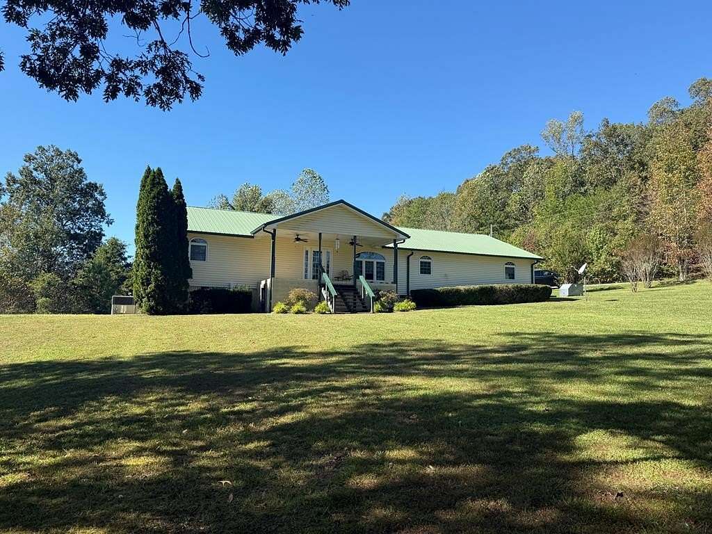 11.2 Acres of Land with Home for Sale in Paris, Tennessee