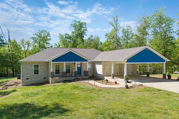 9.25 Acres of Land with Home for Sale in Parsons, Tennessee
