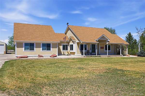 2.77 Acres of Land with Home for Sale in Strasburg, Colorado
