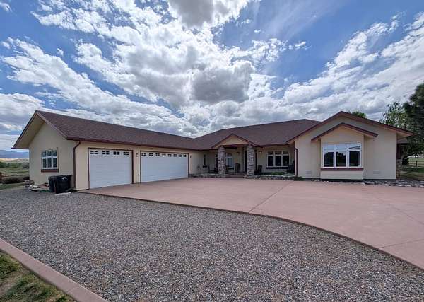 14 Acres of Land with Home for Sale in Montrose, Colorado