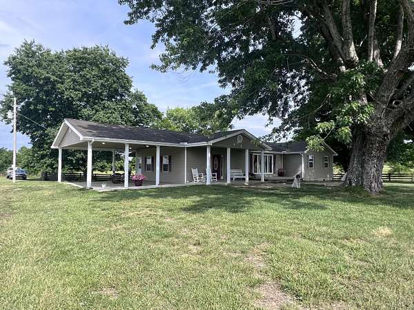 23 Acres of Agricultural Land with Home for Sale in Williamsburg, Kentucky
