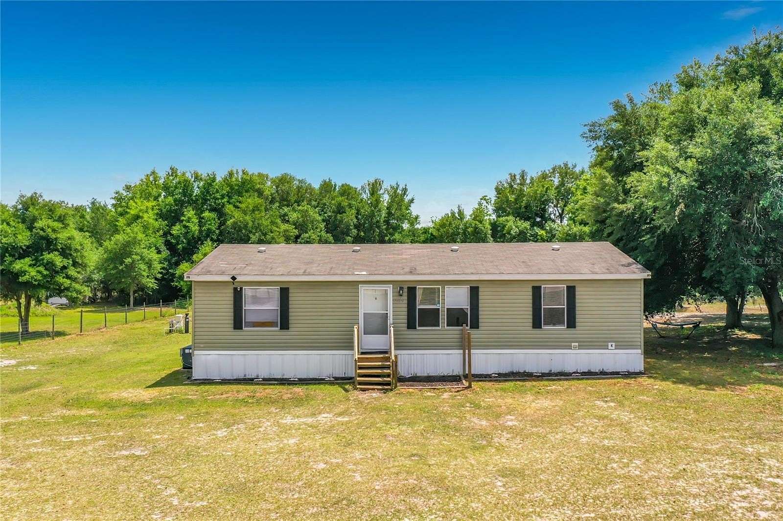 2.72 Acres of Land with Home for Sale in Howey-in-the-Hills, Florida