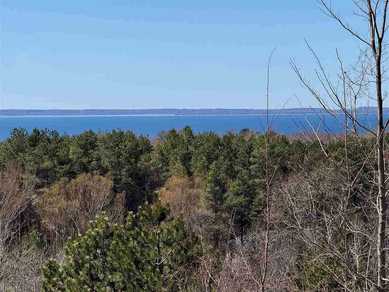 0.9 Acres of Residential Land for Sale in Eastport, Michigan