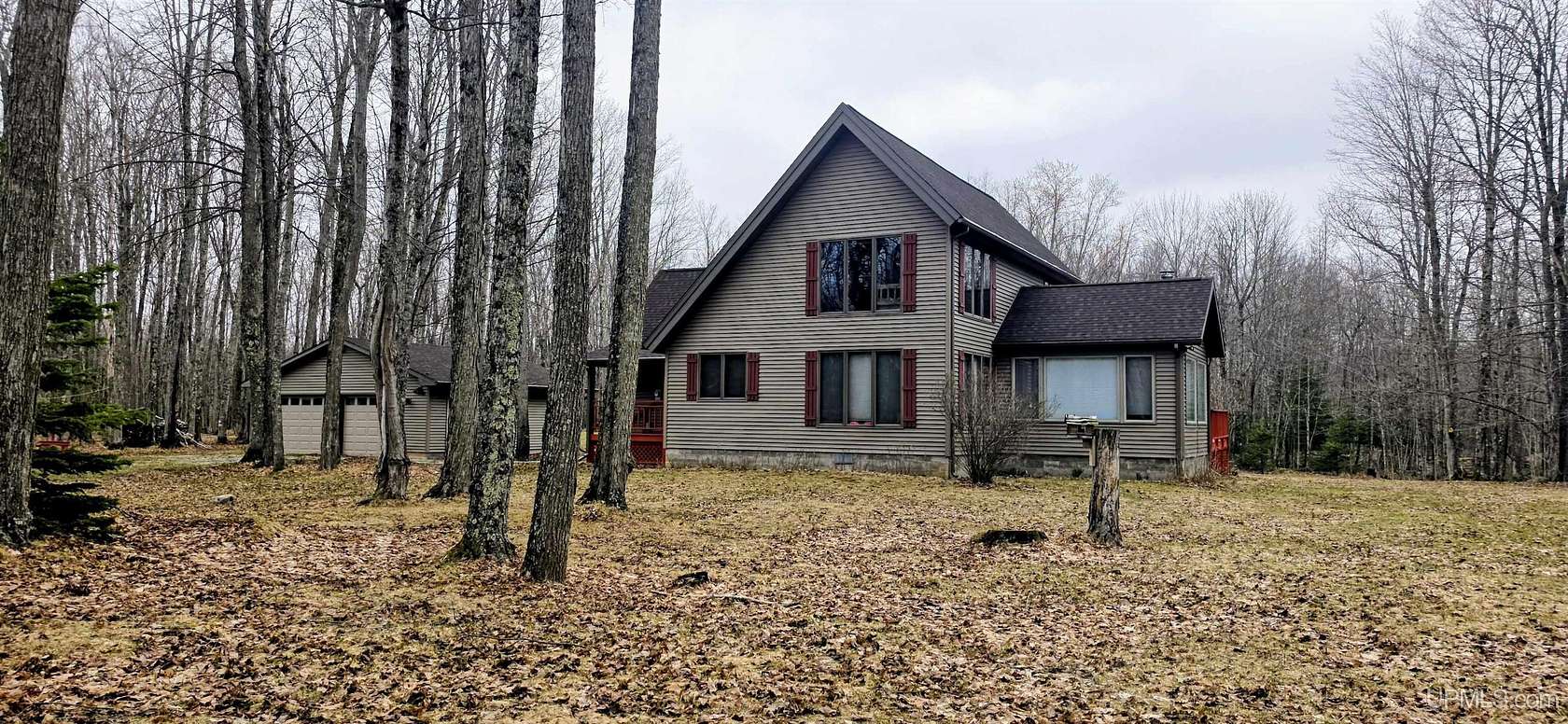40 Acres of Recreational Land with Home for Sale in Rock, Michigan