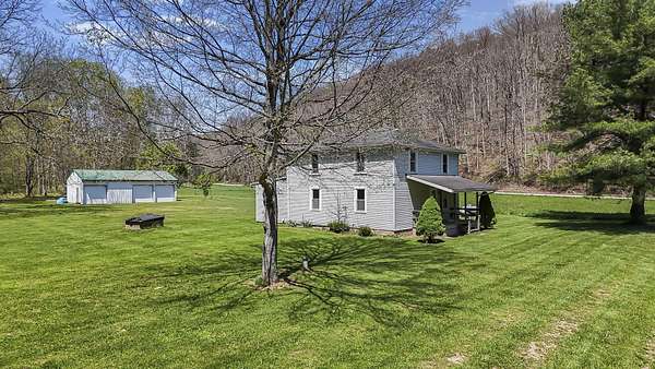 122 Acres of Recreational Land with Home for Sale in McArthur, Ohio