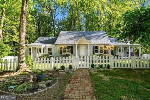 5.49 Acres of Land with Home for Sale in Tracys Landing, Maryland