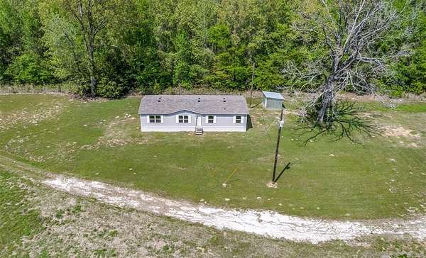 42.2 Acres of Land with Home for Sale in Marietta, Texas