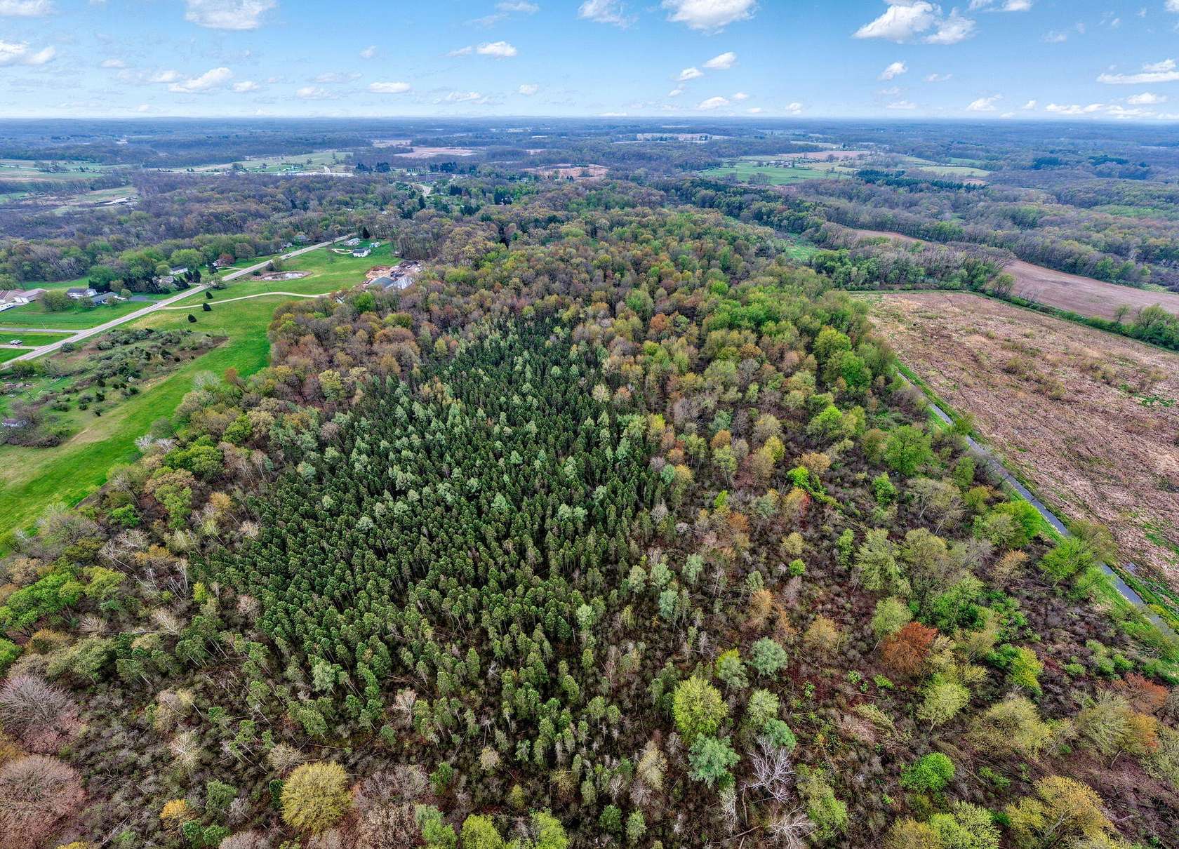 75 Acres of Recreational Land with Home for Sale in Stockbridge, Michigan