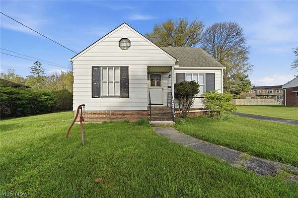 1.59 Acres of Land with Home for Sale in Seven Hills, Ohio