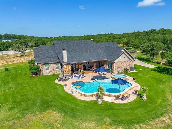11.9 Acres of Recreational Land with Home for Sale in Millsap, Texas