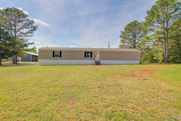 8.6 Acres of Land with Home for Sale in Moulton, Alabama
