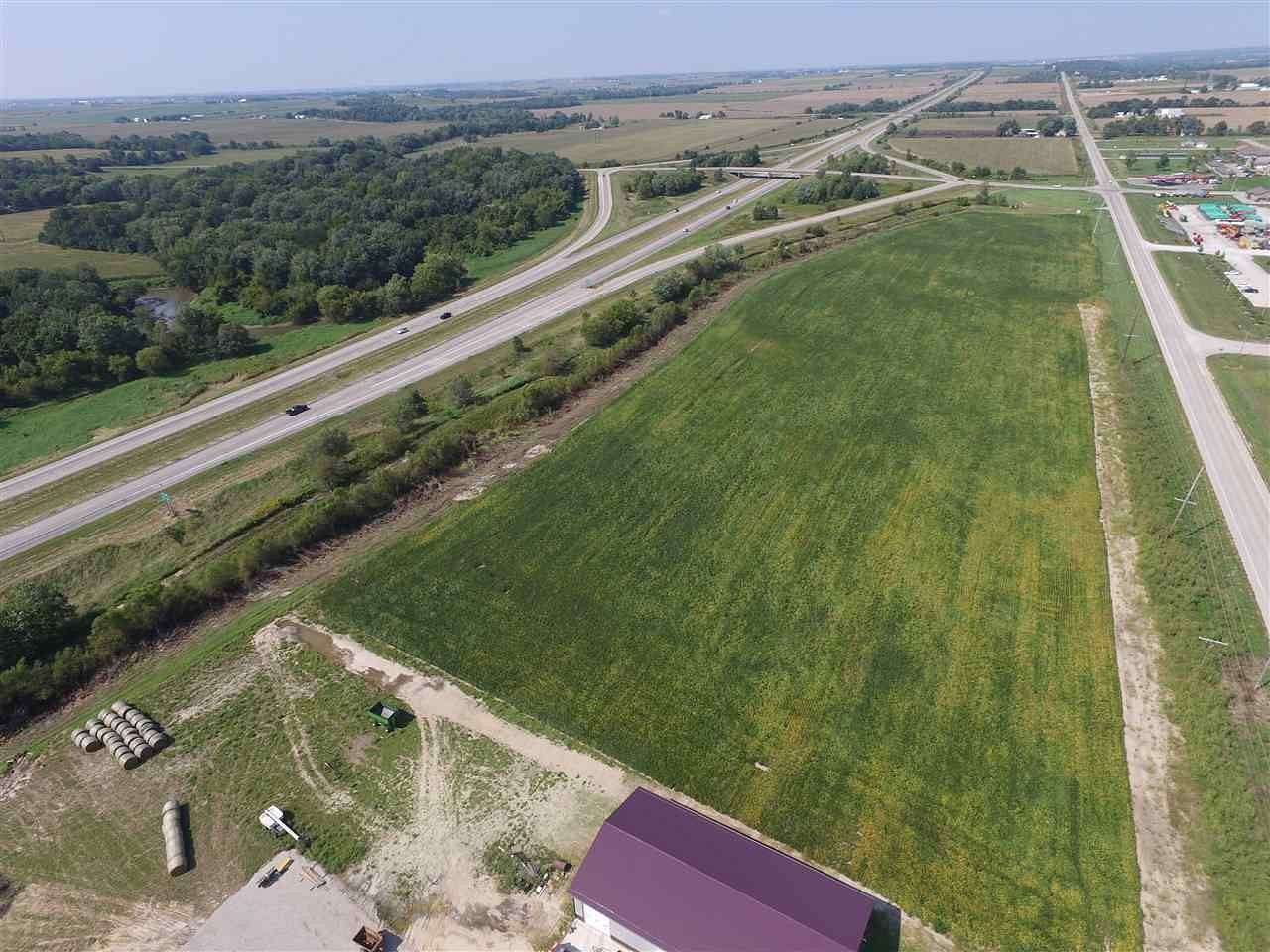 1.24 Acres of Commercial Land for Sale in Hills, Iowa