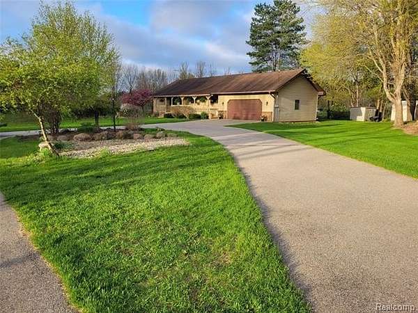 1.53 Acres of Land with Home for Sale in Robinson Township, Michigan