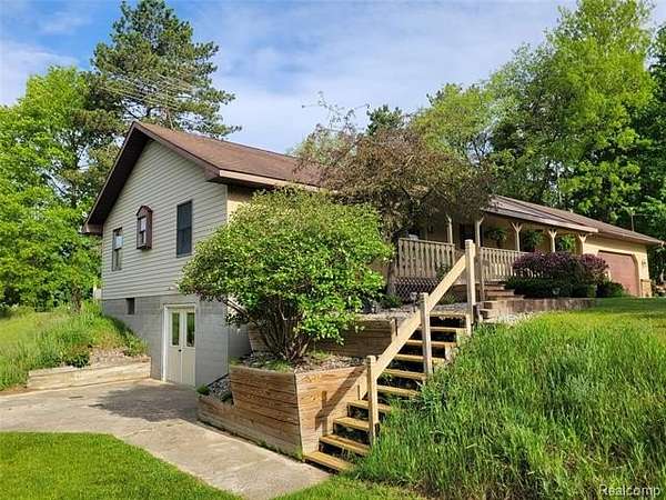 1.53 Acres of Land with Home for Sale in Robinson Township, Michigan