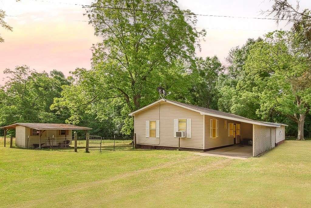 8.15 Acres of Land with Home for Sale in Glenwood, Alabama