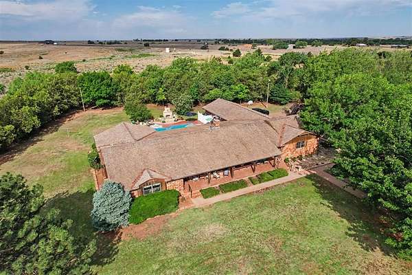 10.8 Acres of Land with Home for Sale in Hammon, Oklahoma