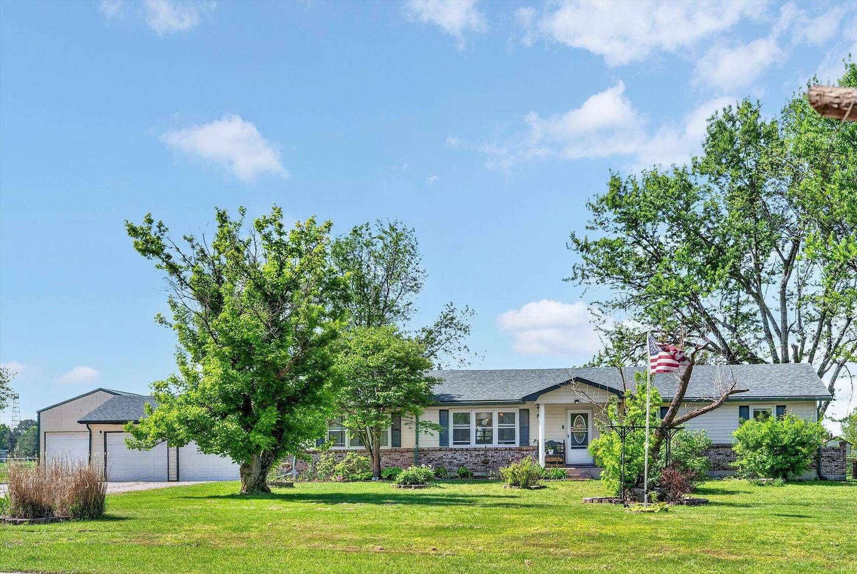 6.4 Acres of Land with Home for Sale in Macks Creek, Missouri