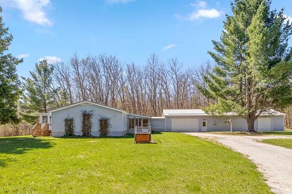 40 Acres of Recreational Land with Home for Sale in Holton, Michigan