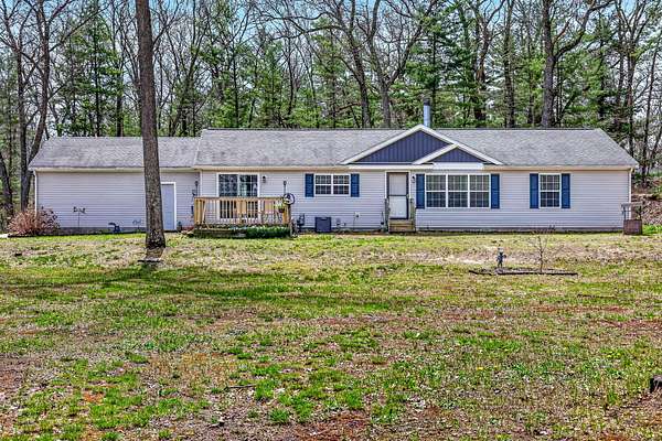 1.67 Acres of Land with Home for Sale in Twin Lake, Michigan