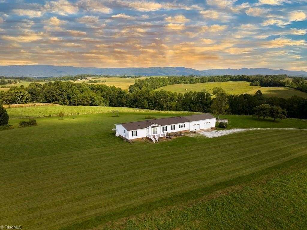 4.76 Acres of Land with Home for Sale in Claudville, Virginia