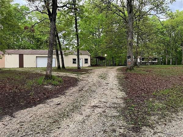 60 Acres of Land with Home for Sale in Hawk Point, Missouri