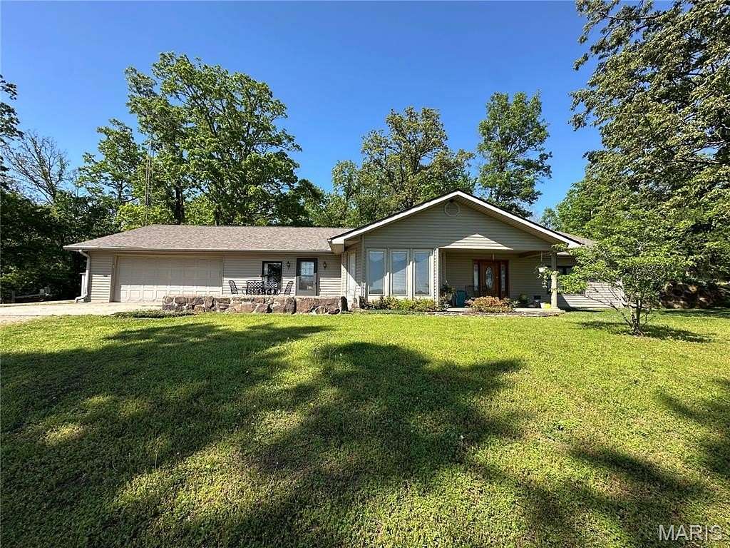 76 Acres of Agricultural Land with Home for Sale in Puxico, Missouri
