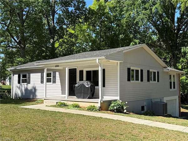 1.73 Acres of Land with Home for Sale in Tobaccoville, North Carolina