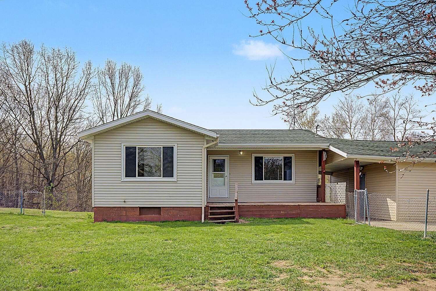 11.5 Acres of Recreational Land with Home for Sale in Cedar Springs, Michigan