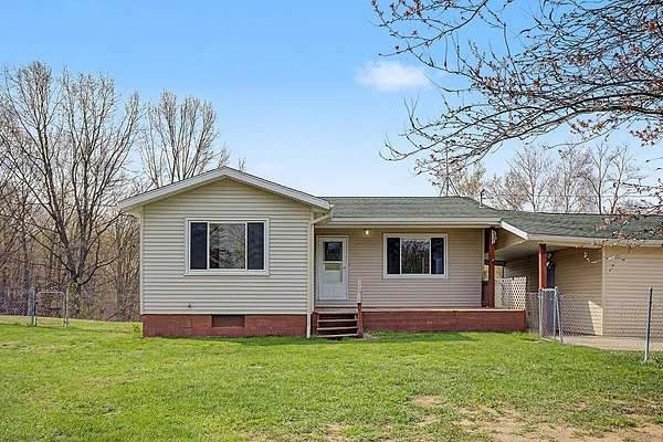 11.5 Acres of Recreational Land with Home for Sale in Cedar Springs, Michigan