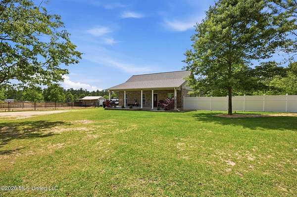 2.2 Acres of Land with Home for Sale in McHenry, Mississippi