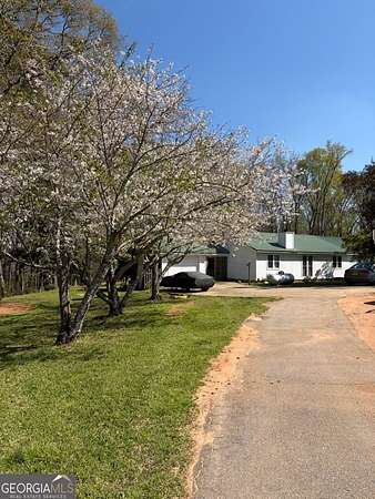 11.6 Acres of Land with Home for Sale in Jackson, Georgia