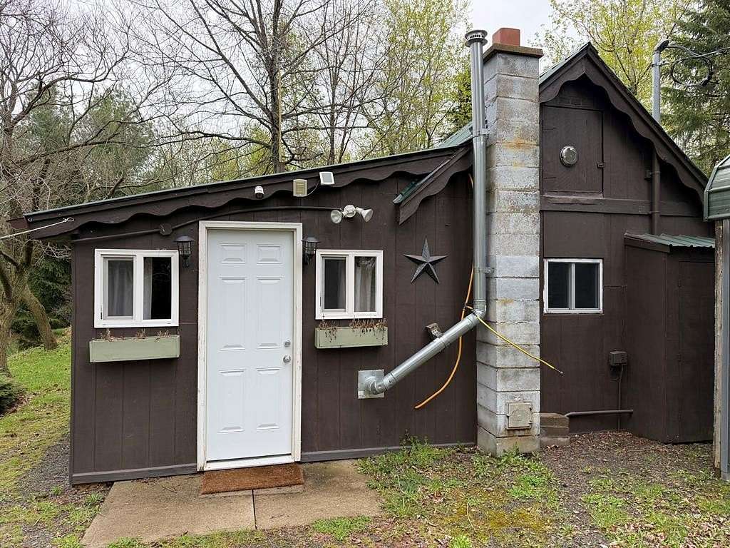 10 Acres of Land with Home for Sale in Mansfield, Pennsylvania