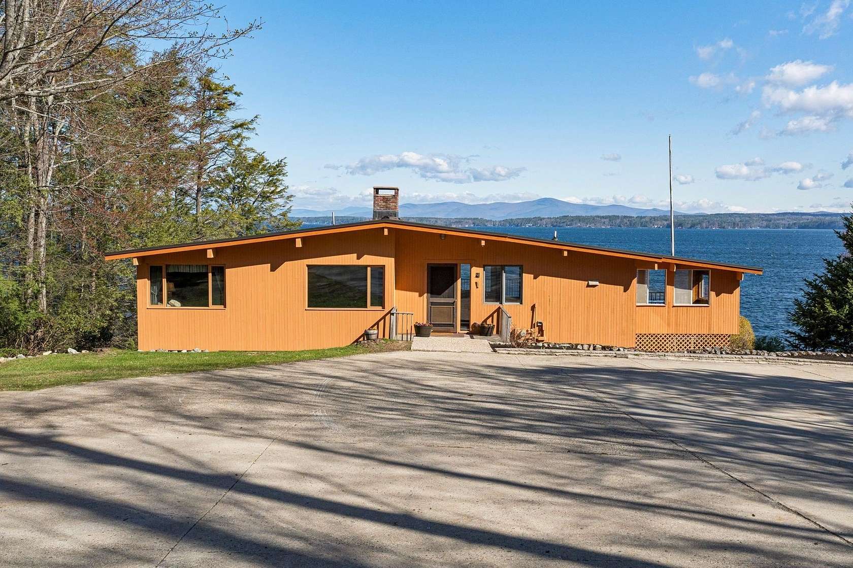 1.5 Acres of Land with Home for Sale in Alton, New Hampshire