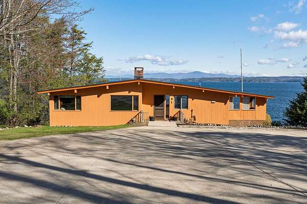 1.5 Acres of Land with Home for Sale in Alton, New Hampshire