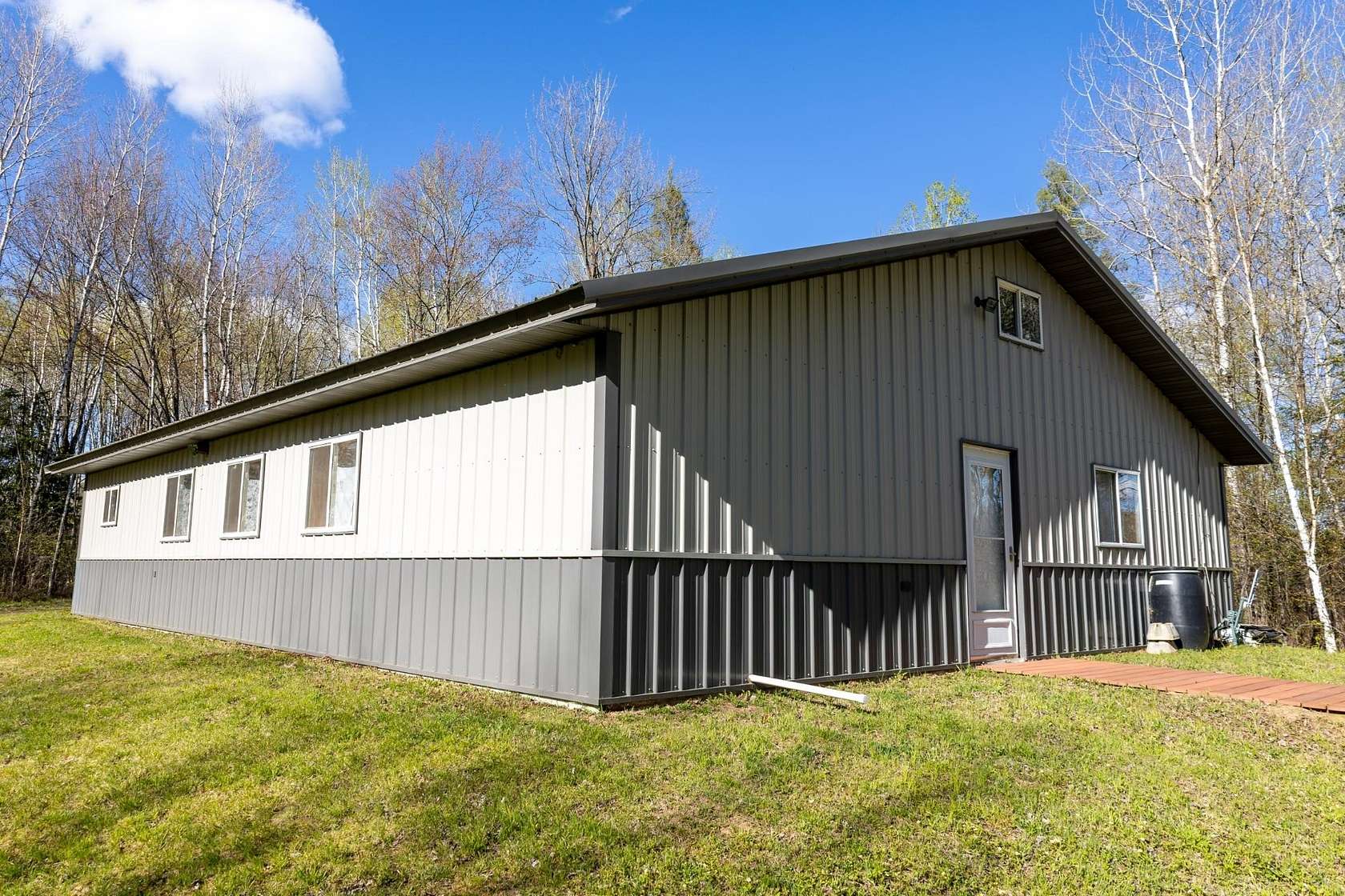 80 Acres of Land with Home for Sale in Ogema, Wisconsin