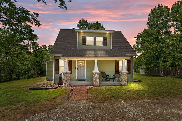 5.47 Acres of Land with Home for Sale in Chadwick, Missouri