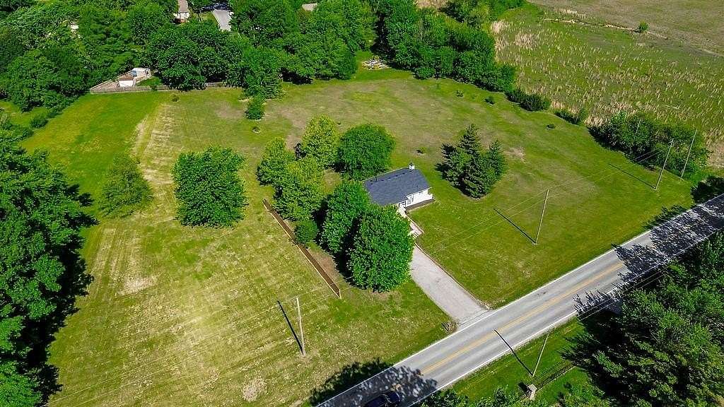 2.5 Acres of Land with Home for Sale in Belton, Missouri