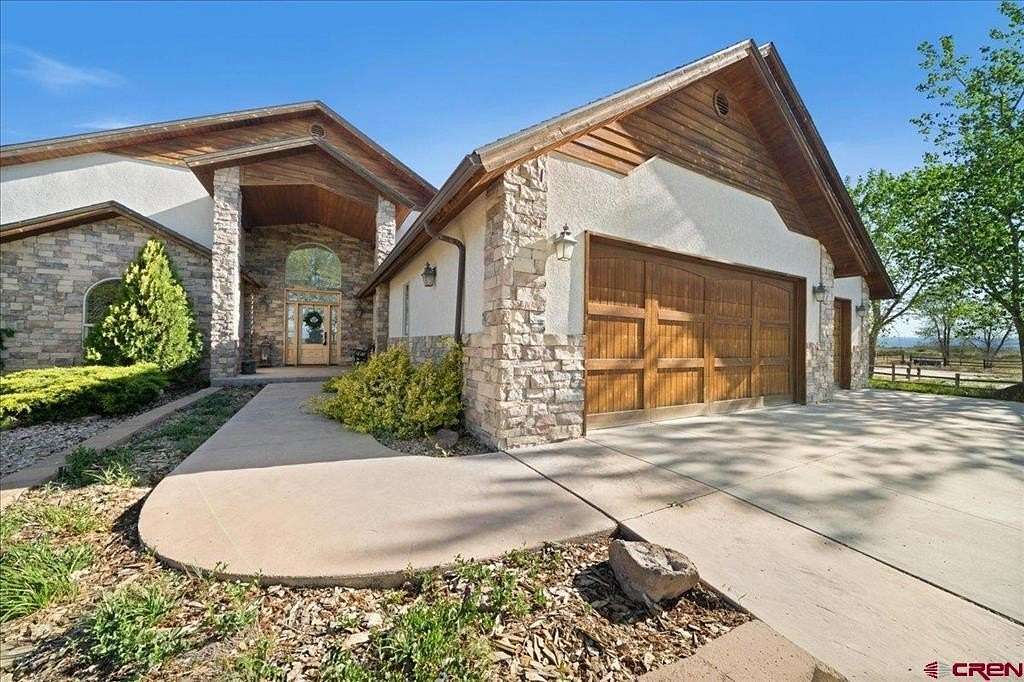21.8 Acres of Agricultural Land with Home for Sale in Montrose, Colorado