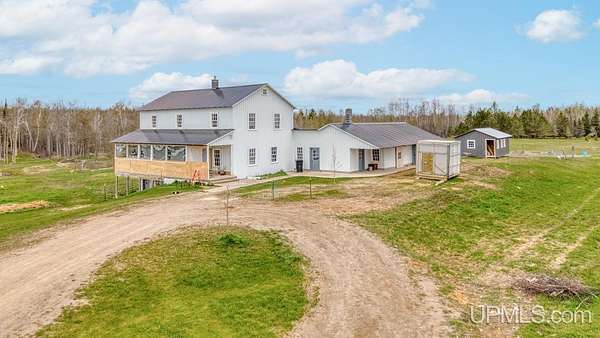 110 Acres of Land with Home for Sale in Gladstone, Michigan