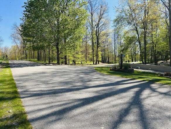 0.58 Acres of Residential Land for Sale in Canadian Lakes, Michigan