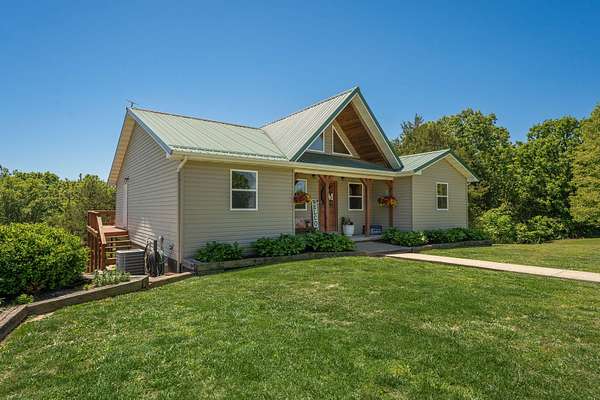 43 Acres of Land with Home for Sale in Hartville, Missouri