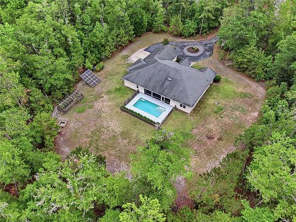 5.62 Acres of Land with Home for Sale in Gainesville, Florida