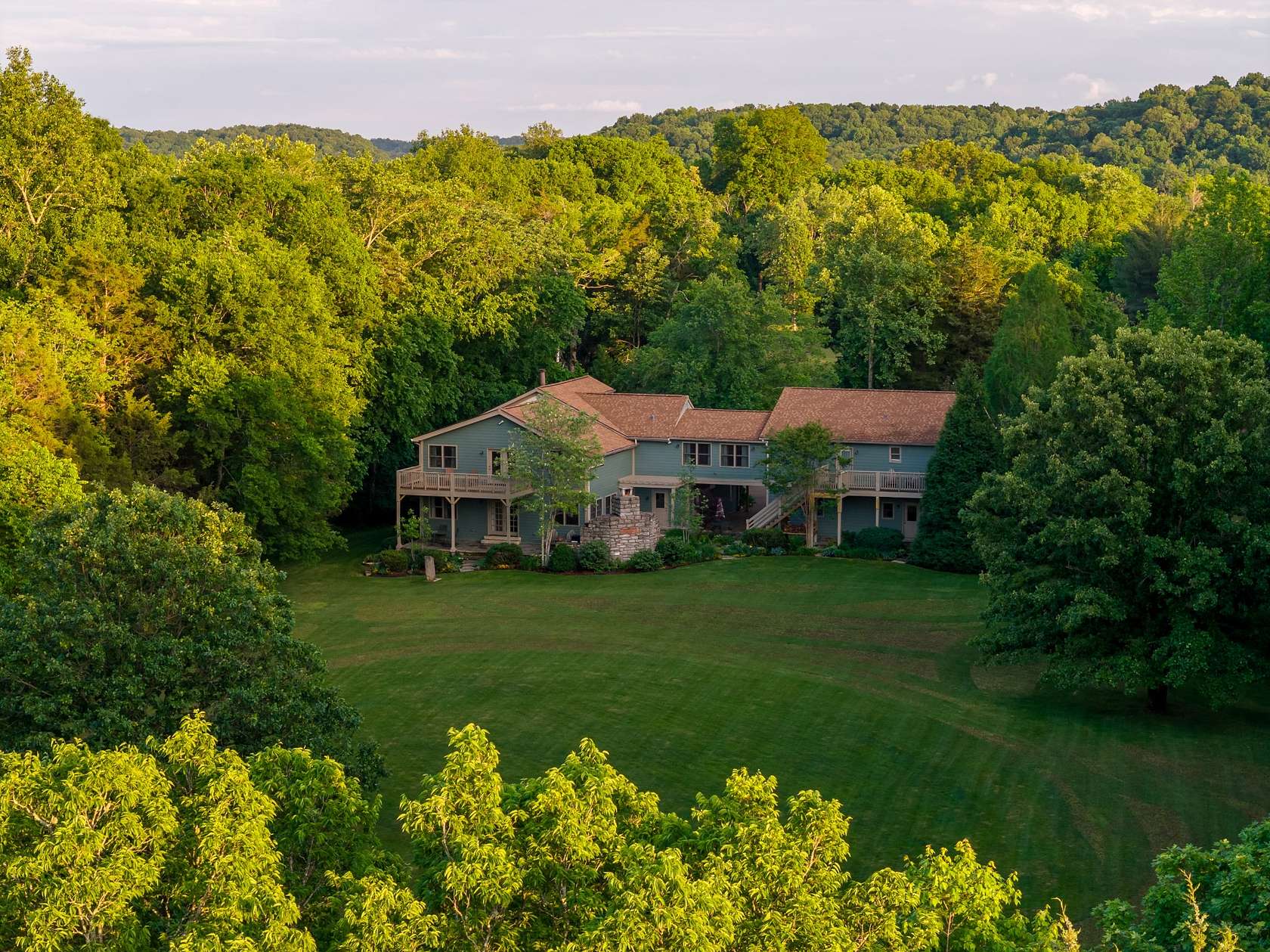 9.9 Acres of Land with Home for Sale in White Bluff, Tennessee
