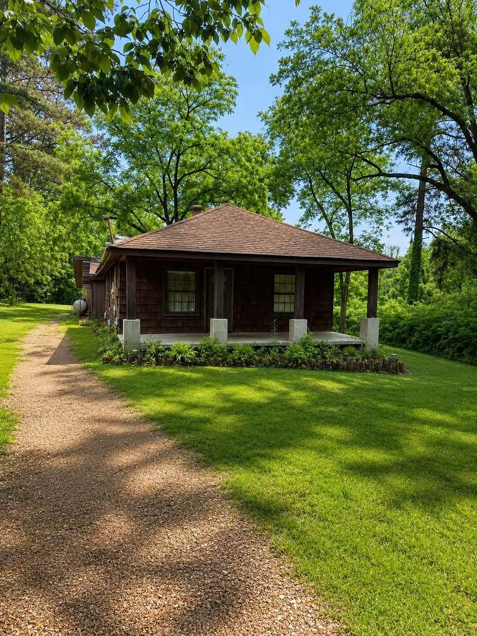11.8 Acres of Recreational Land with Home for Sale in Millington, Tennessee