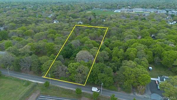 2.5 Acres of Land with Home for Sale in Centereach, New York