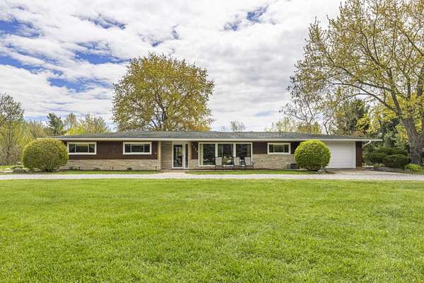 3 Acres of Land with Home for Sale in Benzonia, Michigan