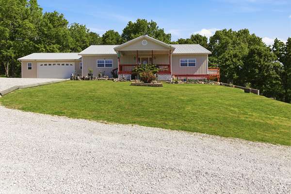 13.6 Acres of Land with Home for Sale in Purdy, Missouri