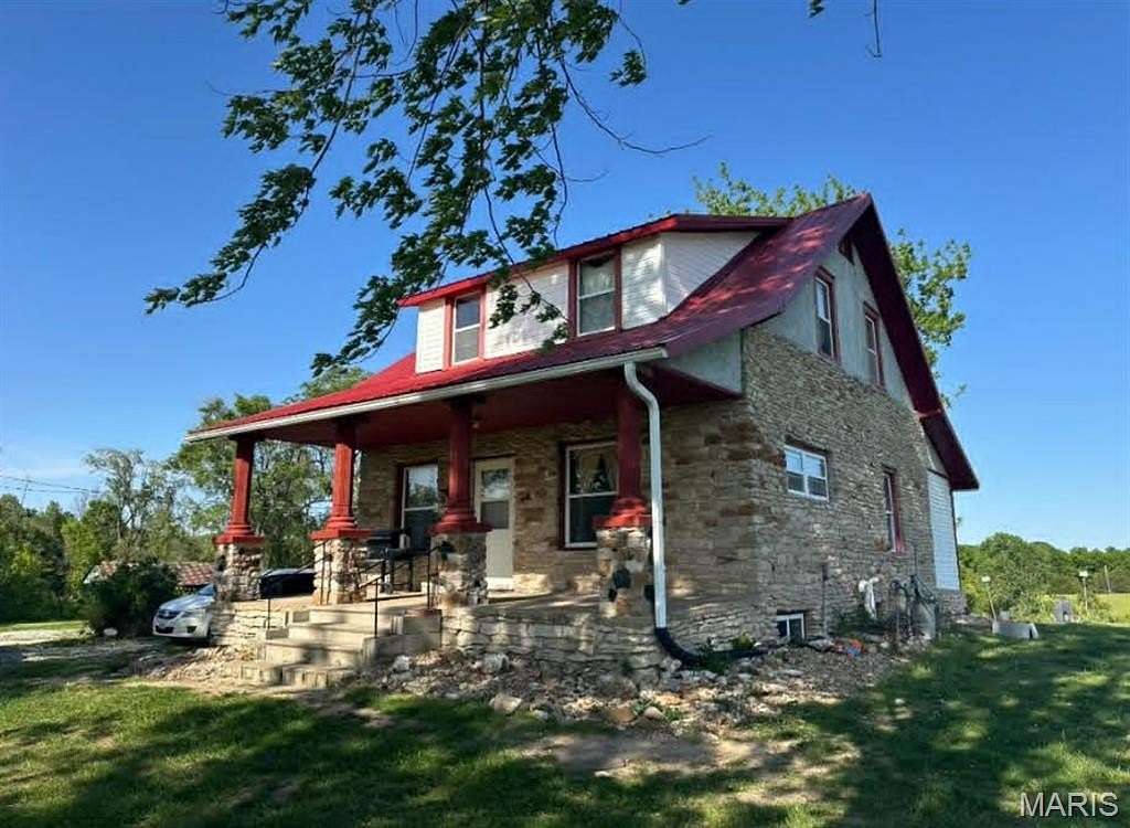 4.9 Acres of Land with Home for Sale in Monroe City, Missouri